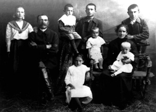 This is a photograph of Conrad and Christina Schreiber's son Wilhelm Conrad and his family taken in 1919. From left to right upper row are: Olinde, Wilhelm, Waldemar, Alexander, Johannes. Left to right lower row are: Maria, Berta, Catharina, and Fredrich on Catharina's lap. Courtesy of André Seifert.
